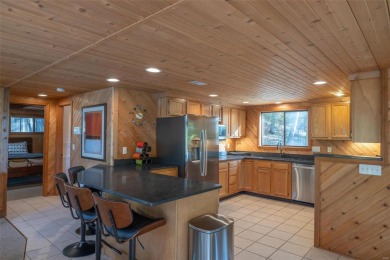 This stunning, fully furnished 4 bed and 2 bath lakefront chalet on Innsbrook Resort Golf Course in Missouri - for sale on GolfHomes.com, golf home, golf lot