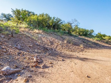 Build your lakeside retreat on this elevated 0.3-acre lot within on Hideout Golf Club and Resort  in Texas - for sale on GolfHomes.com, golf home, golf lot