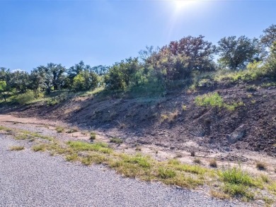 Build your lakeside retreat on this elevated 0.3-acre lot within on Hideout Golf Club and Resort  in Texas - for sale on GolfHomes.com, golf home, golf lot