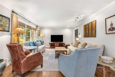 Nestled on a large + acre serene, corner lot in the highly on Bobby Jones Golf Club in Georgia - for sale on GolfHomes.com, golf home, golf lot
