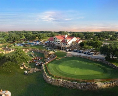Build your lakeside retreat on this elevated 0.3-acre lot within on Hideout Golf Club and Resort  in Texas - for sale on GolfHomes.com, golf home, golf lot