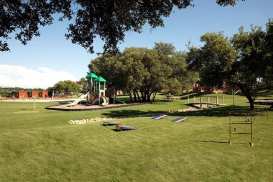 Build your lakeside retreat on this elevated 0.3-acre lot within on Hideout Golf Club and Resort  in Texas - for sale on GolfHomes.com, golf home, golf lot