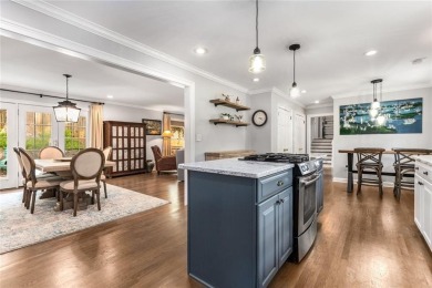 Nestled on a large + acre serene, corner lot in the highly on Bobby Jones Golf Club in Georgia - for sale on GolfHomes.com, golf home, golf lot