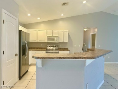 Dreaming of Southwest Florida living? Check out this move-in on Palmetto-Pine Country Club in Florida - for sale on GolfHomes.com, golf home, golf lot