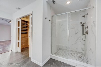 Beautiful extensive renovation in this spacious 1 story DUPLEX on Suntree Country Club in Florida - for sale on GolfHomes.com, golf home, golf lot