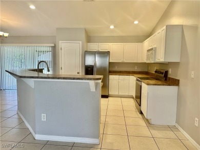 Dreaming of Southwest Florida living? Check out this move-in on Palmetto-Pine Country Club in Florida - for sale on GolfHomes.com, golf home, golf lot