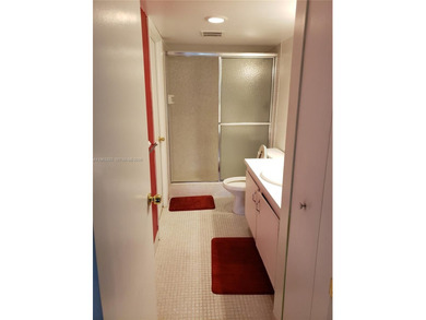 Split level 2 bedroom, 2 bath. Washer Dryer in the unit. Large on Inverrary Country Club in Florida - for sale on GolfHomes.com, golf home, golf lot