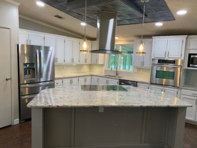 Listed by the Official Sales Team of Cypress Lakes Village on Big Cypress Golf and Country Club in Florida - for sale on GolfHomes.com, golf home, golf lot