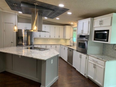 Listed by the Official Sales Team of Cypress Lakes Village on Big Cypress Golf and Country Club in Florida - for sale on GolfHomes.com, golf home, golf lot