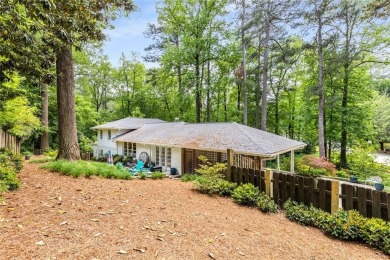 Nestled on a large + acre serene, corner lot in the highly on Bobby Jones Golf Club in Georgia - for sale on GolfHomes.com, golf home, golf lot