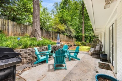 Nestled on a large + acre serene, corner lot in the highly on Bobby Jones Golf Club in Georgia - for sale on GolfHomes.com, golf home, golf lot