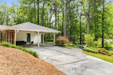 Nestled on a large + acre serene, corner lot in the highly on Bobby Jones Golf Club in Georgia - for sale on GolfHomes.com, golf home, golf lot