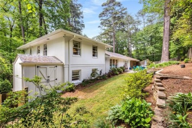 Nestled on a large + acre serene, corner lot in the highly on Bobby Jones Golf Club in Georgia - for sale on GolfHomes.com, golf home, golf lot
