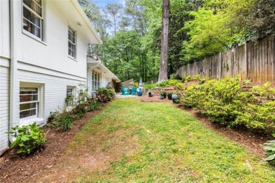 Nestled on a large + acre serene, corner lot in the highly on Bobby Jones Golf Club in Georgia - for sale on GolfHomes.com, golf home, golf lot
