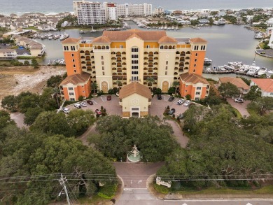 Marbella Condominium sits on a 35-foot bluff in the heart of on Sandpiper Cove Golf Course in Florida - for sale on GolfHomes.com, golf home, golf lot