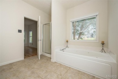 Welcome to this expansive 1.5-story home in the Villages of on The Links At Dardenne in Missouri - for sale on GolfHomes.com, golf home, golf lot