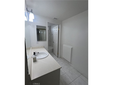 This spacious 4-bedroom, 2.5-bathroom, two-story home features a on Rancho Duarte Golf Course in California - for sale on GolfHomes.com, golf home, golf lot