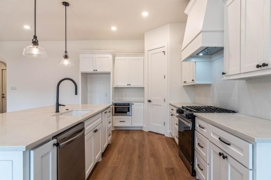 BUILDER OFFERING A 2-1 INTEREST RATE BUYDOWN. Welcome to the on Heath Golf and Yacht Club in Texas - for sale on GolfHomes.com, golf home, golf lot