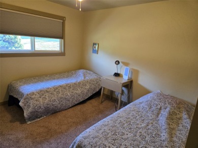 Charming one level ranch home conveniently located by the on Buffalo Hill Golf Club in Montana - for sale on GolfHomes.com, golf home, golf lot