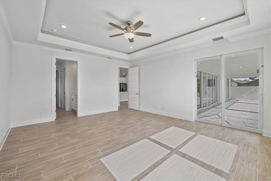 Experience the best of Southwest Florida living with this on Palmetto-Pine Country Club in Florida - for sale on GolfHomes.com, golf home, golf lot