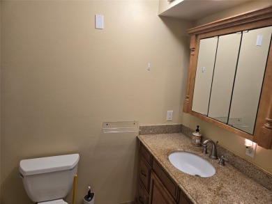 Charming one level ranch home conveniently located by the on Buffalo Hill Golf Club in Montana - for sale on GolfHomes.com, golf home, golf lot