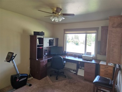 Charming one level ranch home conveniently located by the on Buffalo Hill Golf Club in Montana - for sale on GolfHomes.com, golf home, golf lot