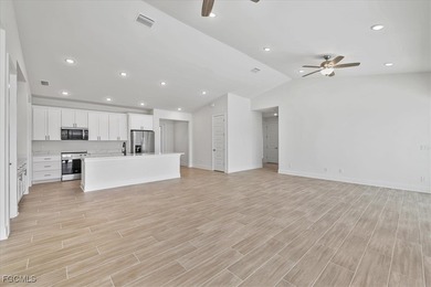 Experience the best of Southwest Florida living with this on Palmetto-Pine Country Club in Florida - for sale on GolfHomes.com, golf home, golf lot