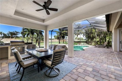 Newly updated! Experience modern elegance in this 3128 sq ft on Shadow Wood Preserve in Florida - for sale on GolfHomes.com, golf home, golf lot