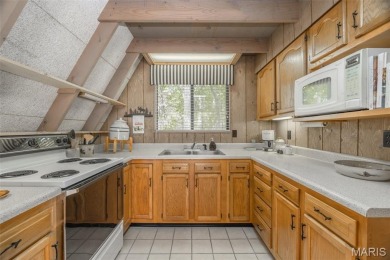 Charming Recreational Chalet  Ideally located within walking on Innsbrook Resort Golf Course in Missouri - for sale on GolfHomes.com, golf home, golf lot