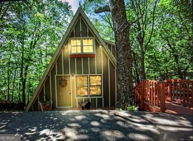 Welcome to your picture-perfect mountain retreat, perched high on Bent Tree Golf Course in Georgia - for sale on GolfHomes.com, golf home, golf lot