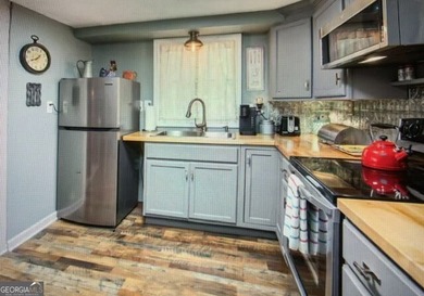 Welcome to your picture-perfect mountain retreat, perched high on Bent Tree Golf Course in Georgia - for sale on GolfHomes.com, golf home, golf lot