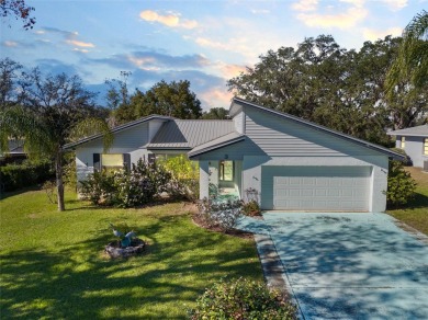 Discover your peaceful retreat in this charming two-bedroom on Sun Air Golf Course in Florida - for sale on GolfHomes.com, golf home, golf lot