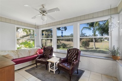 Discover your peaceful retreat in this charming two-bedroom on Sun Air Golf Course in Florida - for sale on GolfHomes.com, golf home, golf lot