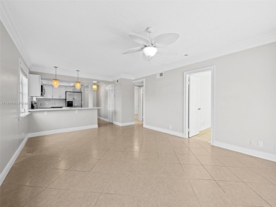Experience golf course living at its finest in this beautifully on  in Florida - for sale on GolfHomes.com, golf home, golf lot