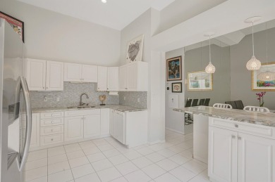 Welcome to this beautifully maintained 3-bedroom, 3-bath home on The Boca Country Club in Florida - for sale on GolfHomes.com, golf home, golf lot