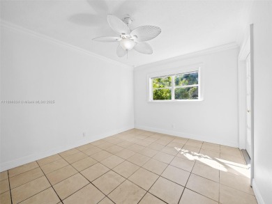 Experience golf course living at its finest in this beautifully on  in Florida - for sale on GolfHomes.com, golf home, golf lot