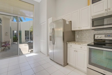 Welcome to this beautifully maintained 3-bedroom, 3-bath home on The Boca Country Club in Florida - for sale on GolfHomes.com, golf home, golf lot
