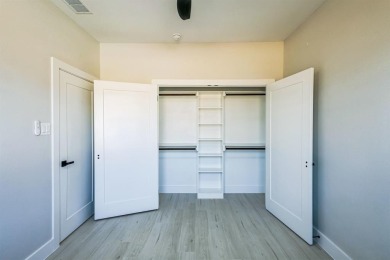 Nestled between Cedar Creek Country Club (golf packages on Cedar Creek Country Club in Texas - for sale on GolfHomes.com, golf home, golf lot