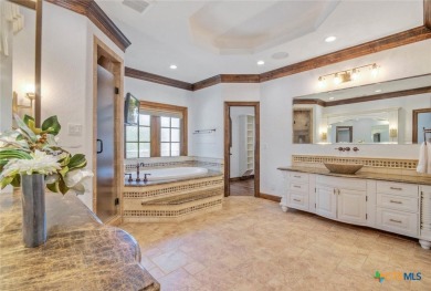 Set on a rare double lot overlooking the scenic Avery Ranch Golf on Avery Ranch Golf Club in Texas - for sale on GolfHomes.com, golf home, golf lot