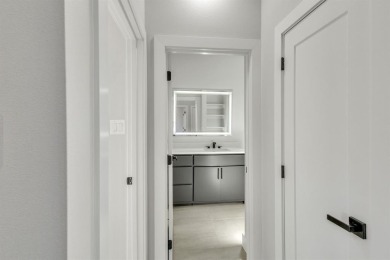Nestled between Cedar Creek Country Club (golf packages on Cedar Creek Country Club in Texas - for sale on GolfHomes.com, golf home, golf lot