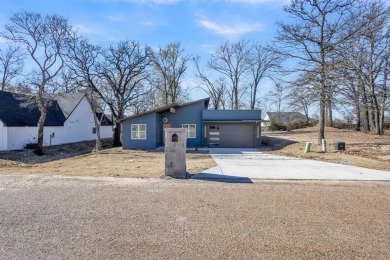 Nestled between Cedar Creek Country Club (golf packages on Cedar Creek Country Club in Texas - for sale on GolfHomes.com, golf home, golf lot