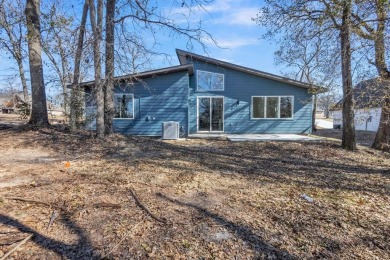 Nestled between Cedar Creek Country Club (golf packages on Cedar Creek Country Club in Texas - for sale on GolfHomes.com, golf home, golf lot