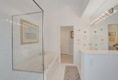 Welcome to this beautifully maintained 3-bedroom, 3-bath home on The Boca Country Club in Florida - for sale on GolfHomes.com, golf home, golf lot