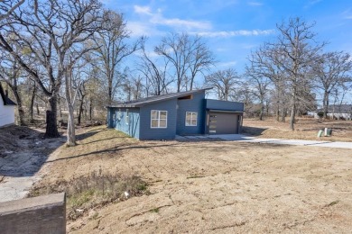 Nestled between Cedar Creek Country Club (golf packages on Cedar Creek Country Club in Texas - for sale on GolfHomes.com, golf home, golf lot
