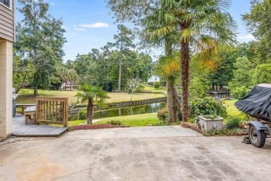 Discover the charm of low country living in this stunning on Santee-Cooper Country Club in South Carolina - for sale on GolfHomes.com, golf home, golf lot