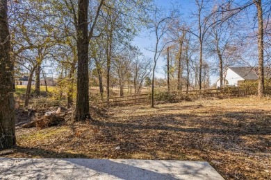 Nestled between Cedar Creek Country Club (golf packages on Cedar Creek Country Club in Texas - for sale on GolfHomes.com, golf home, golf lot