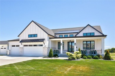 This farmhouse modern single family home is amazing! The main on Otter Creek Golf Course in Iowa - for sale on GolfHomes.com, golf home, golf lot