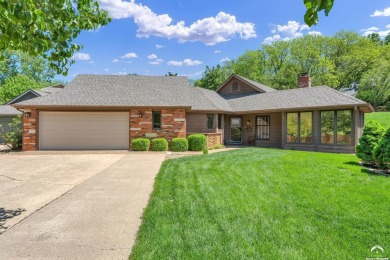 Unique open floor plan.  Living room featuring a vaulted ceiling on Alvamar Country Club in Kansas - for sale on GolfHomes.com, golf home, golf lot