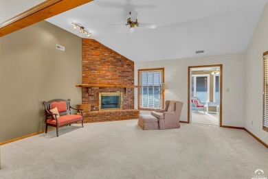 Unique open floor plan.  Living room featuring a vaulted ceiling on Alvamar Country Club in Kansas - for sale on GolfHomes.com, golf home, golf lot