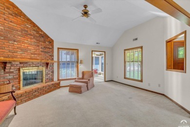 Unique open floor plan.  Living room featuring a vaulted ceiling on Alvamar Country Club in Kansas - for sale on GolfHomes.com, golf home, golf lot